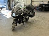 a motorcycle that is parked in a garage