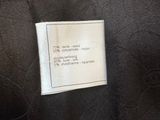 a close up of a piece of fabric with a label on it