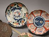 several plates and a coin are sitting on a table