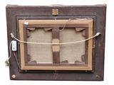 a picture of an old wooden box with a window
