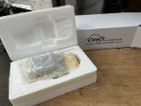 a white box that has some kind of electronic device in it