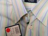 a close up of a shirt with a tag on it