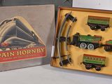 a box with a train set in it on a table