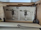 an old photo of a woman in a bathing suit in a suitcase