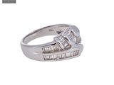 an image of a white gold ring with three baguets of diamonds