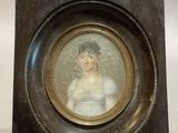 a picture of a woman in a white dress in a picture frame