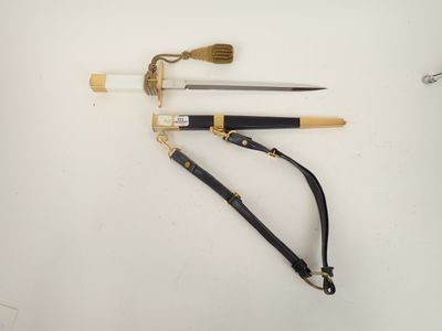 a couple of tools sitting on top of a table next to each other
