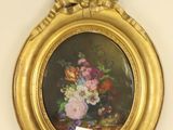 a picture of a picture of flowers in a vase on the wall