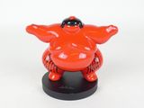 figurine of a fat man in a red suit