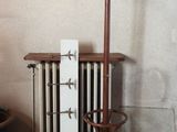 a lamp that is on a stand in a room