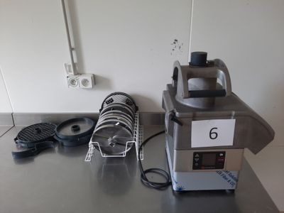 a machine that is sitting on a table in the kitchen