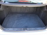 a trunk of a car with the back seat folded down