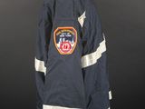 an image of a fireman ' s jacket on a mannequin stand