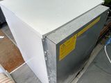 an image of a refrigerator in a room with a lot of appliances