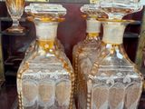 two vases that are sitting next to each other on a table