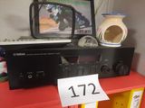 a picture of a stereo system with a tv on top of it