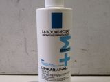 the bottle of la roche - posyl lotion is sitting on the counter