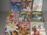 the covers of comics are lined up on the table