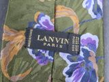 a close up of a tie with a label on it