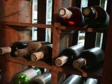 many bottles of wine on the shelves in the room
