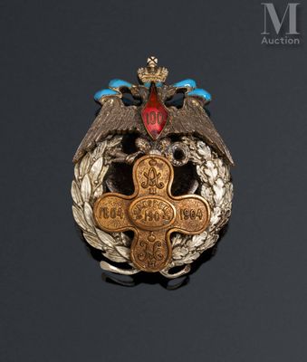 an image of a badge with an eagle and a cross on it