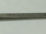 a knife that is laying on top of a table