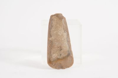 a small piece of stone that is sitting on a table