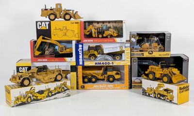 a lot of construction vehicles that are in boxes