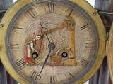 a clock that is sitting on top of a table