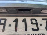 a close up of a license plate on a car