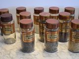 a lot of spices that are on the counter