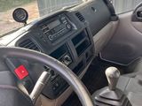 dashboard of a car with a steering wheel and dashboard controls