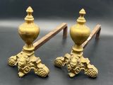 pair of antique brass candlesticks with lion heads on bases