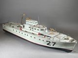 a model of a boat on display on a table