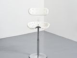 an image of a white chair in a corner of a room