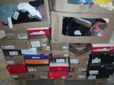 many boxes stacked on top of each other on the floor