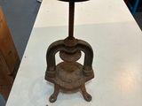 a table with a metal object on it in a room
