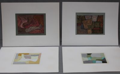 three framed pictures of a couple of paintings on a wall