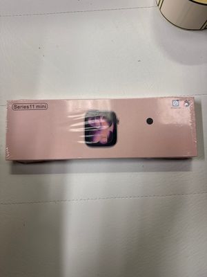 une boîte rose sur laquelle figure l'image d'une femme