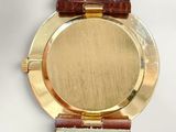 an image of a close up of a watch on a white surface