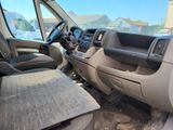 a view of the inside of a van with the driver ' s seat up