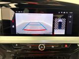 a picture of a car dashboard with a car ' s rear view camera