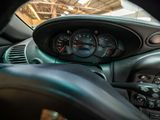 a view of the dashboard of a car from inside the vehicle