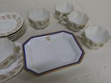 many plates and cups on the table together