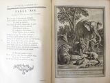 an open book with a picture of an elephant and other animals