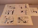 plusieurs dessins représentant des personnes dans différentes poses, posés sur une table