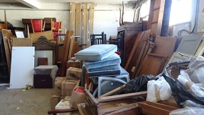 a room filled with lots of different types of furniture