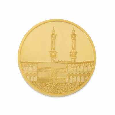 pièce d'or sur laquelle figure une mosquée en arrière-plan