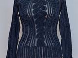 the top of a blue sweater on a mannequin mannequin mannequin mannequin mannequin mannequin mannequin mannequin