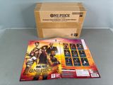 a box of one piece cards and a box of one piece cards